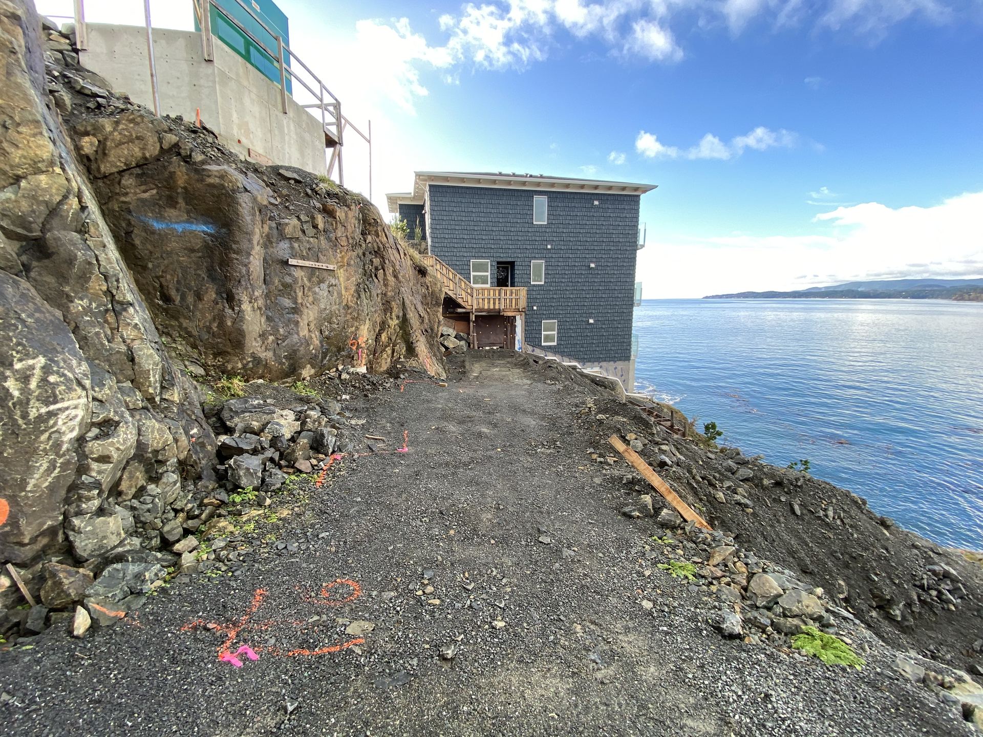 Coast Geotechnical engineer conducting site investigation in British Columbia